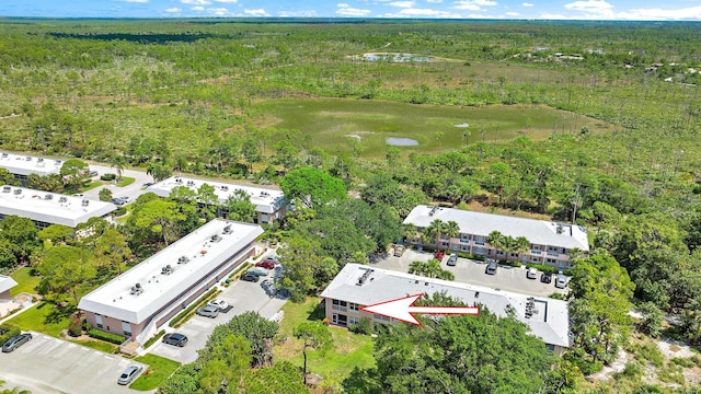 18081 SE Country Club Dr Unit 370, Tequesta, FL 33469 - bird's eye view of a heavily wooded area and a nearby body of water