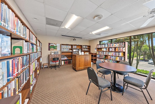 18081 SE Country Club Dr Unit 370, Tequesta, FL 33469 - office featuring bookshelves, light carpet, and a drop ceiling