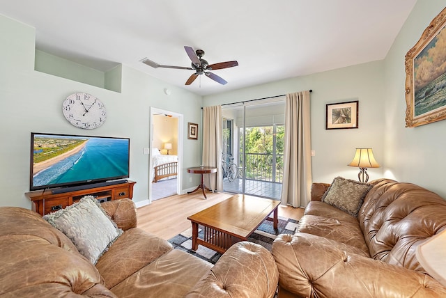 18081 SE Country Club Dr Unit 370, Tequesta, FL 33469 - living room featuring ceiling fan, light wood-type flooring, and baseboards