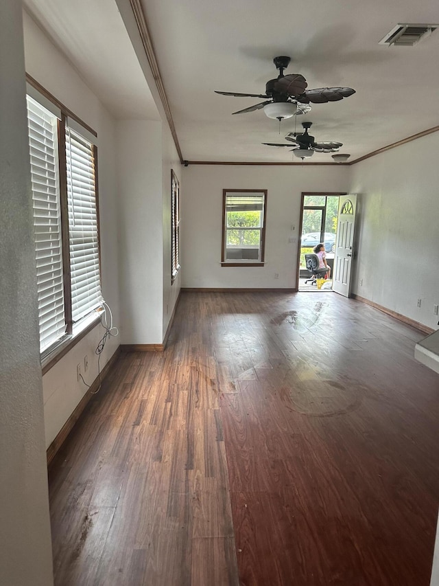 119 S 13th St, Fort Pierce, FL 34950 - empty room with wood finished floors, a ceiling fan, baseboards, and ornamental molding