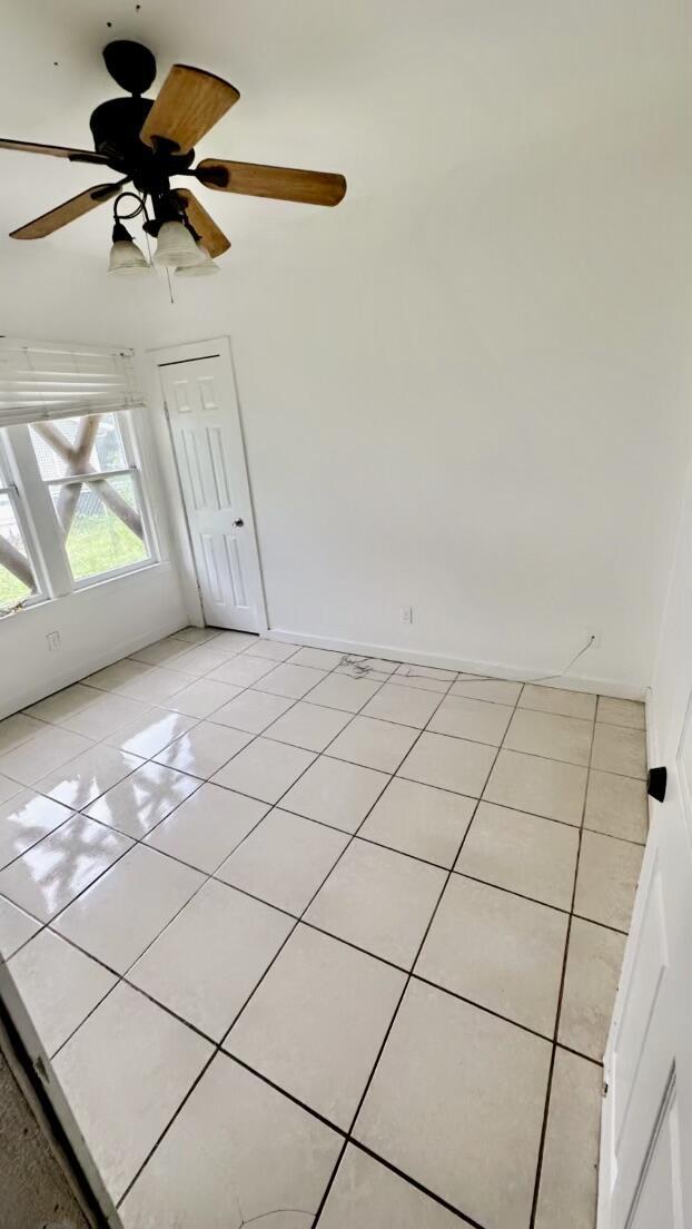119 S 13th St, Fort Pierce, FL 34950 - unfurnished room featuring light tile patterned floors and a ceiling fan