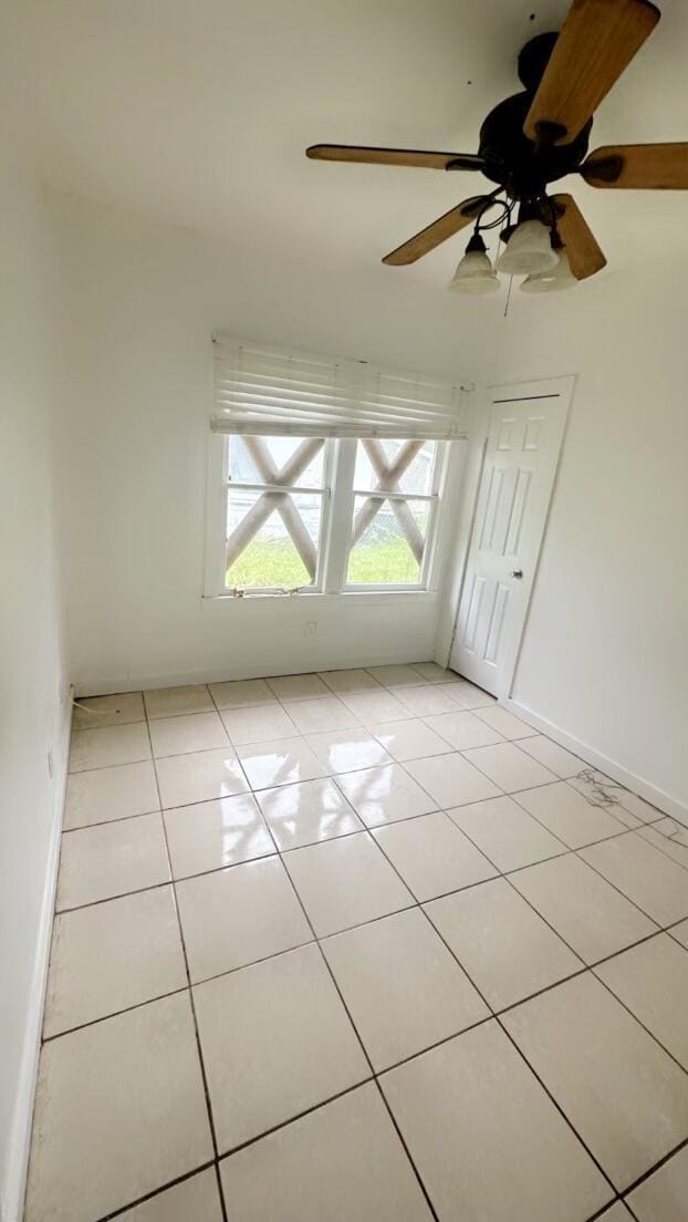 119 S 13th St, Fort Pierce, FL 34950 - unfurnished room with light tile patterned floors and baseboards