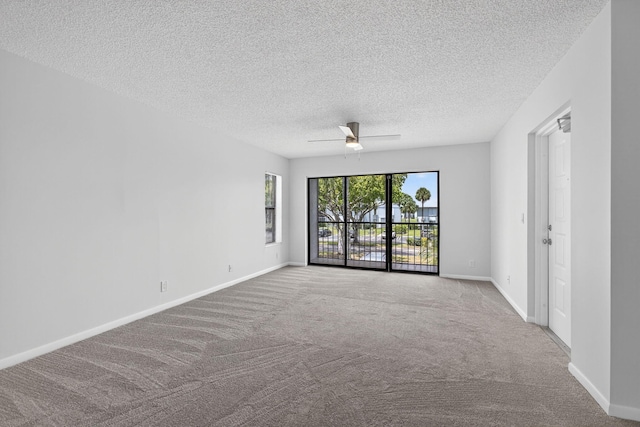 1104 Green Pine Blvd Unit D2, West Palm Beach, FL 33409 - carpeted spare room featuring a ceiling fan and a textured ceiling
