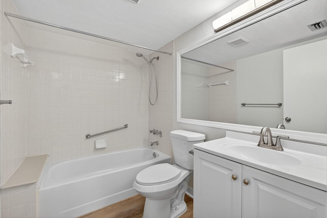 1104 Green Pine Blvd Unit D2, West Palm Beach, FL 33409 - full bathroom featuring wood finished floors, shower / bathtub combination, and vanity