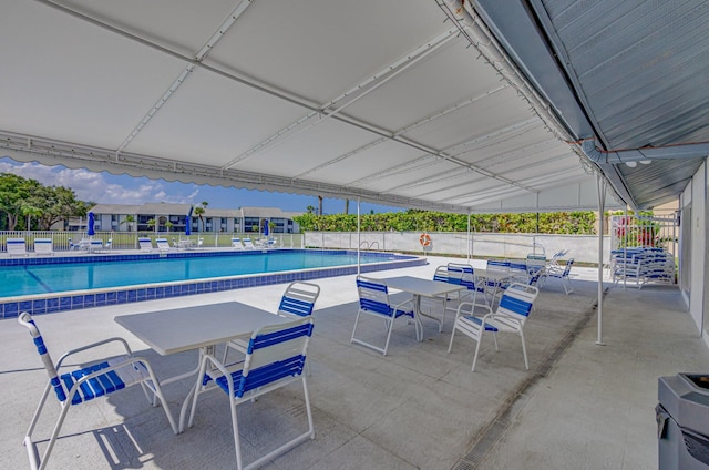 1104 Green Pine Blvd Unit D2, West Palm Beach, FL 33409 - community pool with a patio area