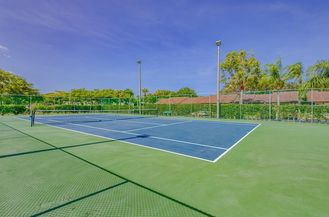 1104 Green Pine Blvd Unit D2, West Palm Beach, FL 33409 - view of tennis court featuring community basketball court