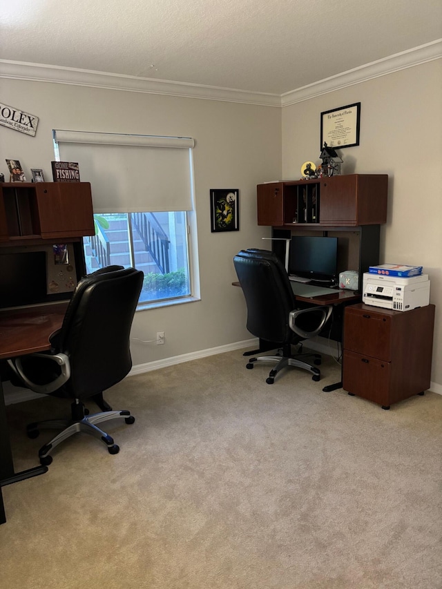 home office with ornamental molding, light colored carpet, and baseboards