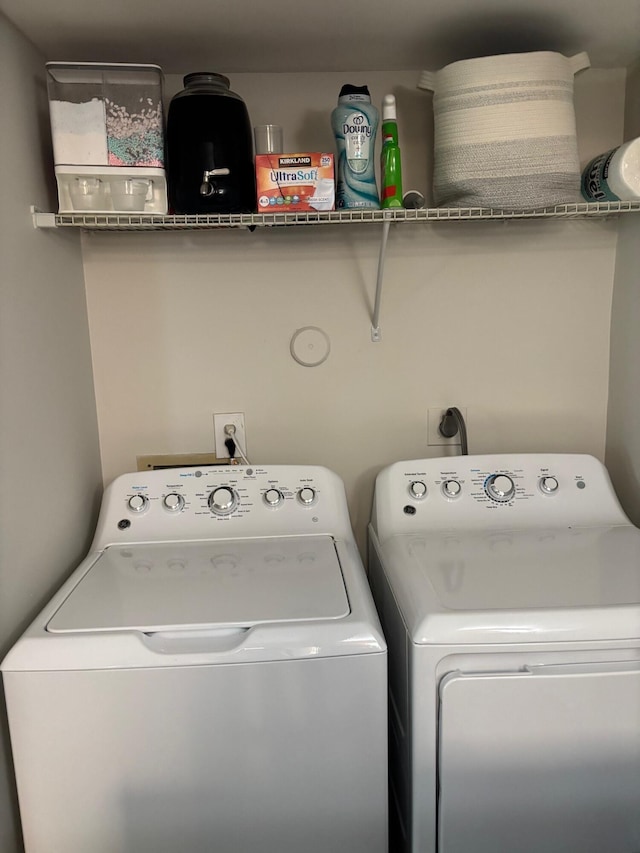 laundry room with washer and dryer