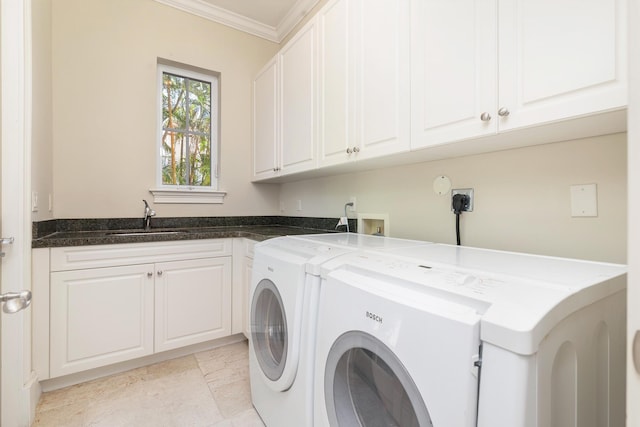 3309 S Flagler Dr, West Palm Beach, FL 33405 - laundry room featuring independent washer and dryer, cabinet space, and crown molding
