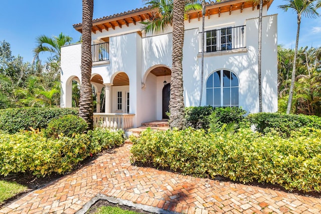 3309 S Flagler Dr, West Palm Beach, FL 33405 - mediterranean / spanish-style house featuring a balcony and stucco siding