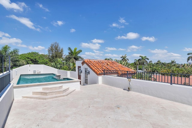 3309 S Flagler Dr, West Palm Beach, FL 33405 - view of swimming pool with a patio area, a fenced backyard, and a hot tub