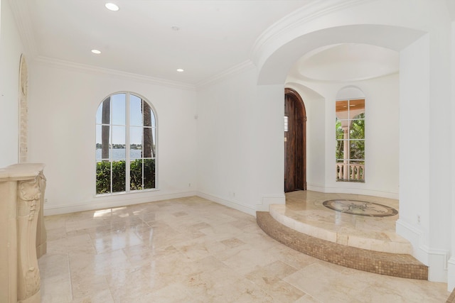 3309 S Flagler Dr, West Palm Beach, FL 33405 - empty room featuring marble tiled floors, healthy amount of natural light, arched walkways, recessed lighting, and baseboards