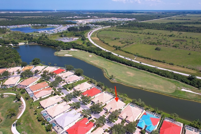 1056 SW Balmoral Trce, Stuart, FL 34997 - aerial view of residential area featuring a nearby body of water and a local golf course