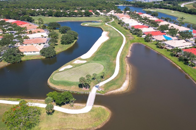 1056 SW Balmoral Trce, Stuart, FL 34997 - aerial view of property's location with a golf course, a nearby body of water, and nearby suburban area