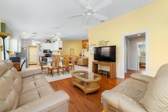 1056 SW Balmoral Trce, Stuart, FL 34997 - living room featuring ceiling fan, light wood-style flooring, and recessed lighting