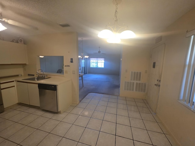 7690 Tahiti Ln Unit 202, Lake Worth, FL 33467 - kitchen featuring dishwasher, a sink, ceiling fan, light countertops, and white cabinets