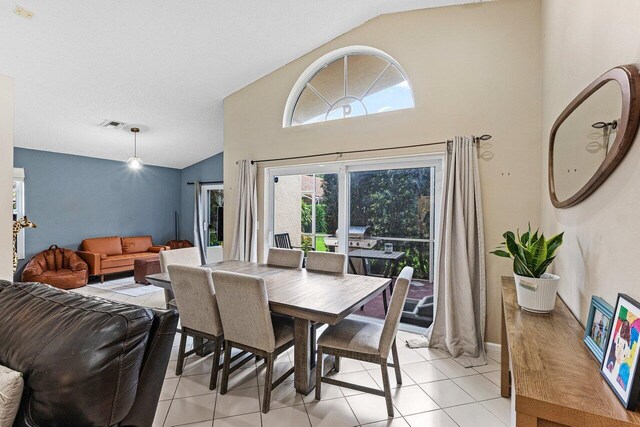 5350 Casa Real Dr, Delray Beach, FL 33484 - dining area featuring light tile patterned floors and high vaulted ceiling