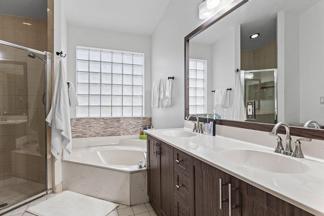 5350 Casa Real Dr, Delray Beach, FL 33484 - full bathroom with a garden tub, a shower stall, double vanity, and tile patterned floors