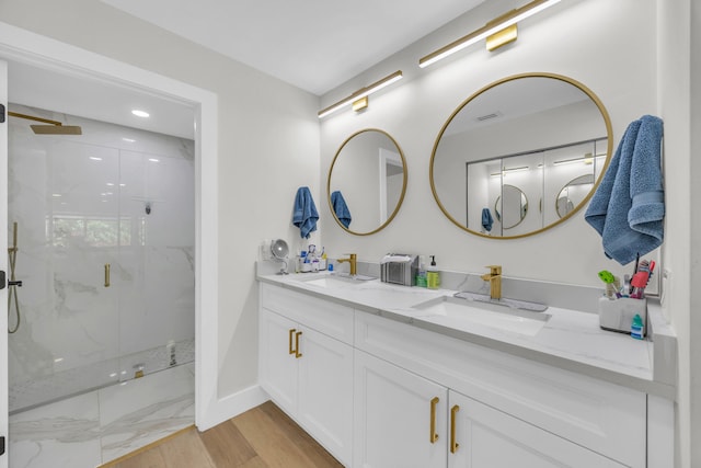 8076 Sweetbriar Way, Boca Raton, FL 33496 - full bathroom featuring a marble finish shower, double vanity, baseboards, wood finished floors, and recessed lighting
