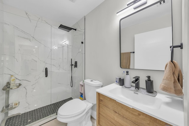 8076 Sweetbriar Way, Boca Raton, FL 33496 - bathroom featuring a marble finish shower, vanity, and toilet