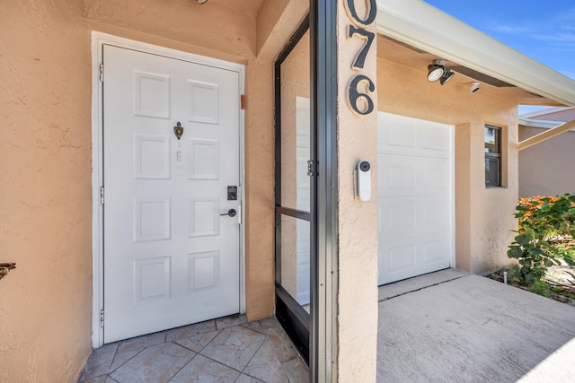8076 Sweetbriar Way, Boca Raton, FL 33496 - view of exterior entry featuring stucco siding