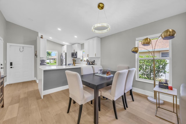 8076 Sweetbriar Way, Boca Raton, FL 33496 - dining area featuring light wood-style floors, lofted ceiling, baseboards, and recessed lighting