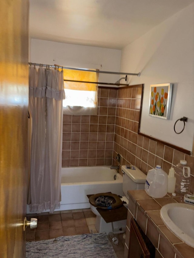 1511 W 32nd St, Riviera Beach, FL 33404 - full bathroom featuring tile patterned flooring, backsplash, toilet, shower / tub combo, and vanity