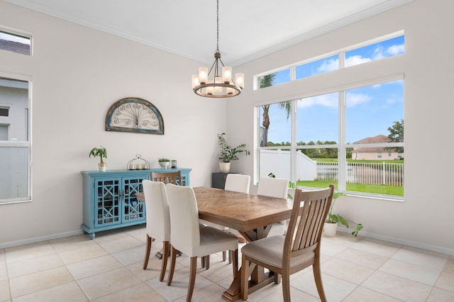 225 NW Magnolia Lakes Blvd, Port Saint Lucie, FL 34986 - dining area with a chandelier, ornamental molding, baseboards, light tile patterned flooring, and a water view