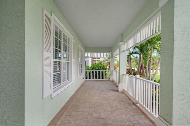 225 NW Magnolia Lakes Blvd, Port Saint Lucie, FL 34986 - view of patio / terrace with a balcony