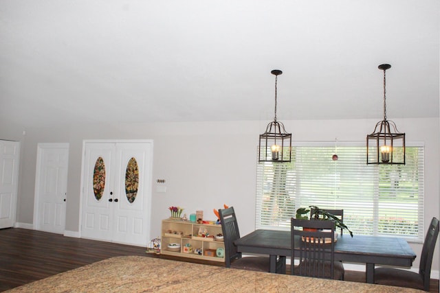 2182 SE Bersell Rd, Port Saint Lucie, FL 34952 - dining space with wood finished floors and baseboards