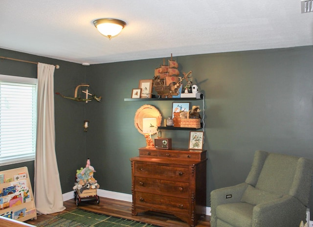 2182 SE Bersell Rd, Port Saint Lucie, FL 34952 - living area with wood finished floors and baseboards