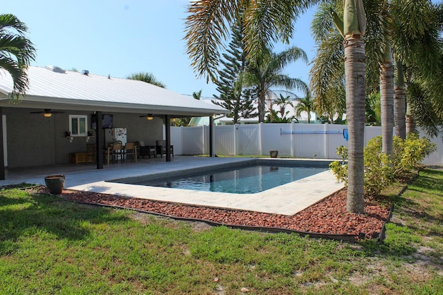 2182 SE Bersell Rd, Port Saint Lucie, FL 34952 - view of swimming pool featuring a ceiling fan and a patio