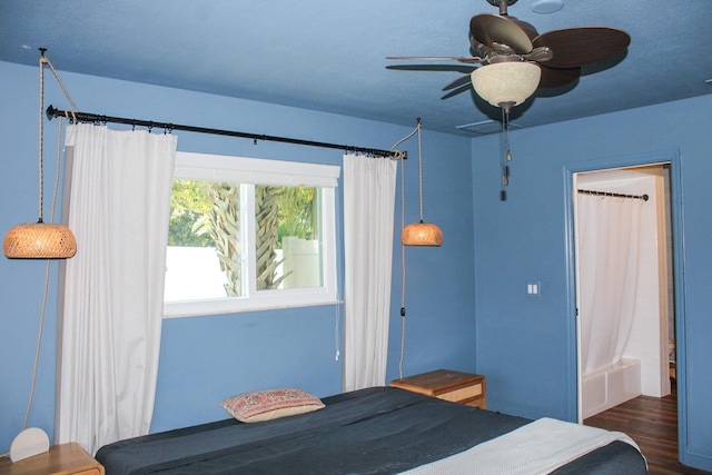 2182 SE Bersell Rd, Port Saint Lucie, FL 34952 - bedroom featuring dark wood-style flooring