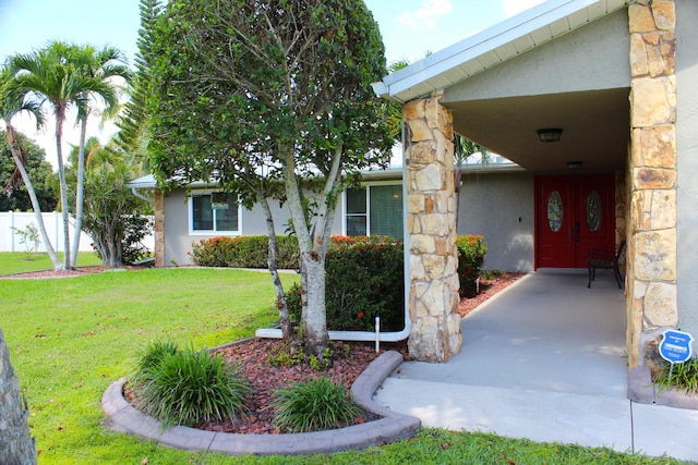 2182 SE Bersell Rd, Port Saint Lucie, FL 34952 - entrance to property featuring stucco siding