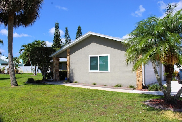 2182 SE Bersell Rd, Port Saint Lucie, FL 34952 - view of property exterior featuring stucco siding