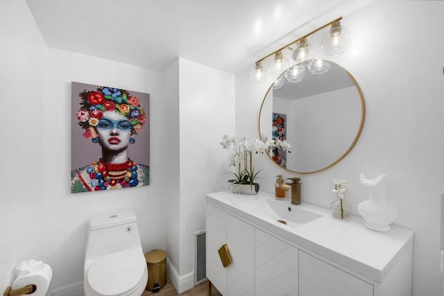 3570 S Ocean Blvd Unit 506, South Palm Beach, FL 33480 - bathroom featuring vanity and toilet