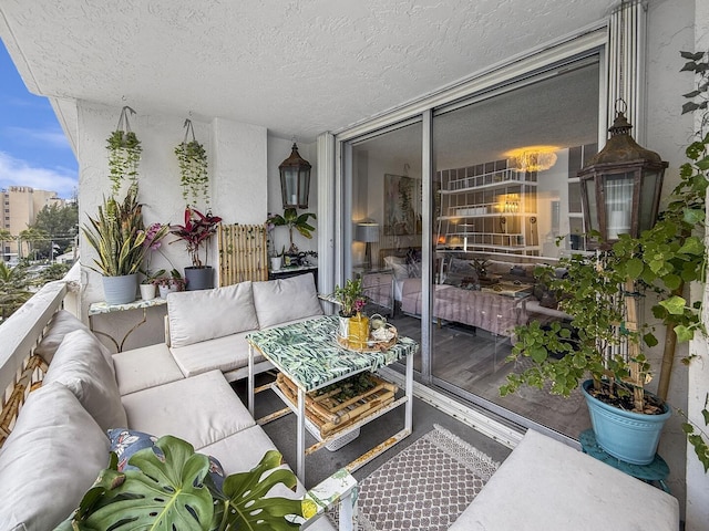 3570 S Ocean Blvd Unit 506, South Palm Beach, FL 33480 - balcony with outdoor lounge area