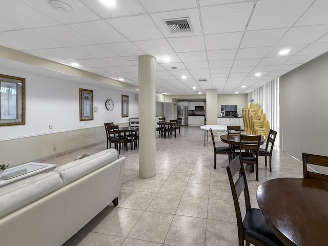 3570 S Ocean Blvd Unit 506, South Palm Beach, FL 33480 - living area with light tile patterned floors, recessed lighting, and a drop ceiling
