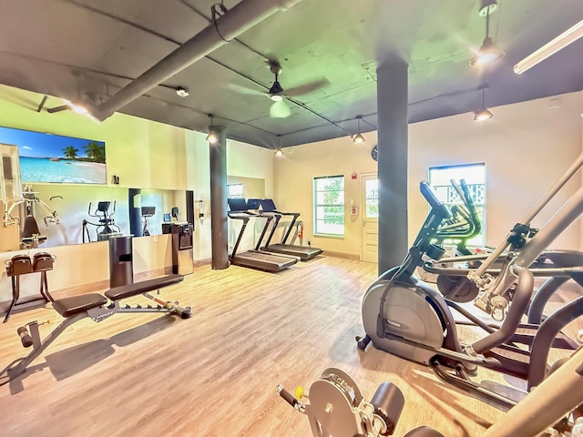 3570 S Ocean Blvd Unit 506, South Palm Beach, FL 33480 - workout area featuring wood finished floors and baseboards