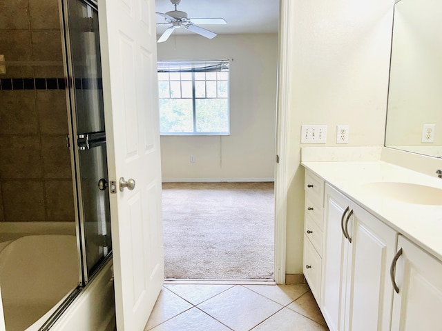 6511 Emerald Dunes Dr Unit 308, West Palm Beach, FL 33411 - full bathroom with a ceiling fan, tile patterned floors, vanity, baseboards, and shower / bath combination with glass door