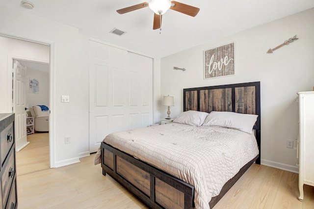 9800 Stover Way, Wellington, FL 33414 - bedroom with light wood finished floors, a closet, baseboards, and ceiling fan
