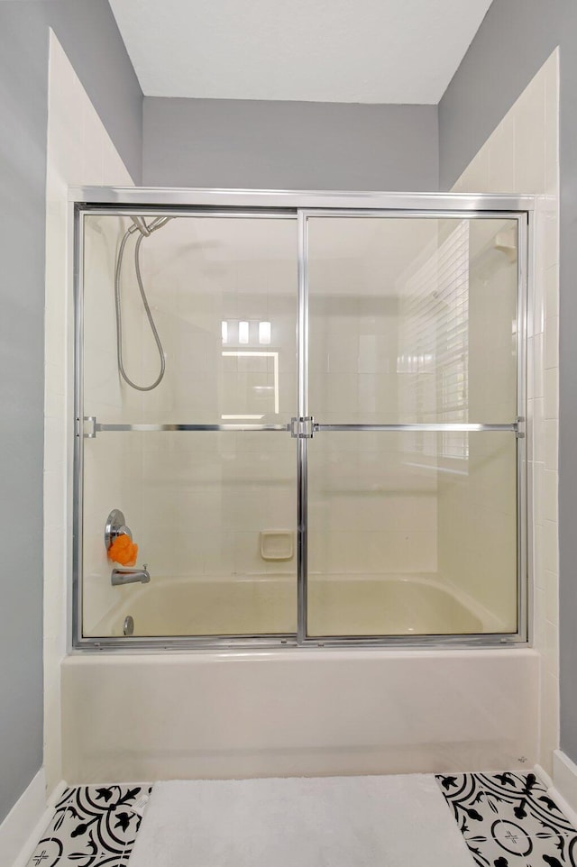 9800 Stover Way, Wellington, FL 33414 - full bathroom with bath / shower combo with glass door and baseboards