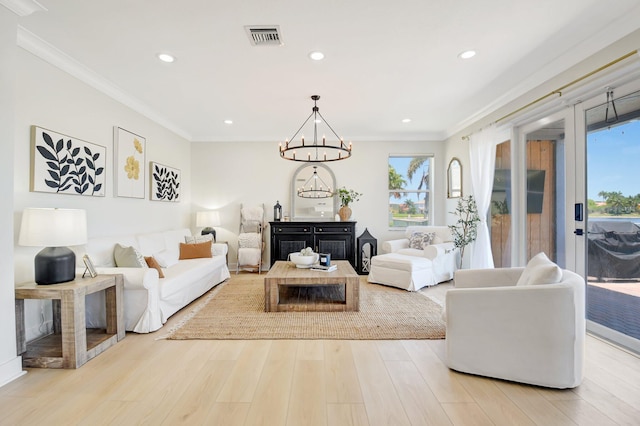 9800 Stover Way, Wellington, FL 33414 - living room with wood finished floors, a chandelier, ornamental molding, and recessed lighting