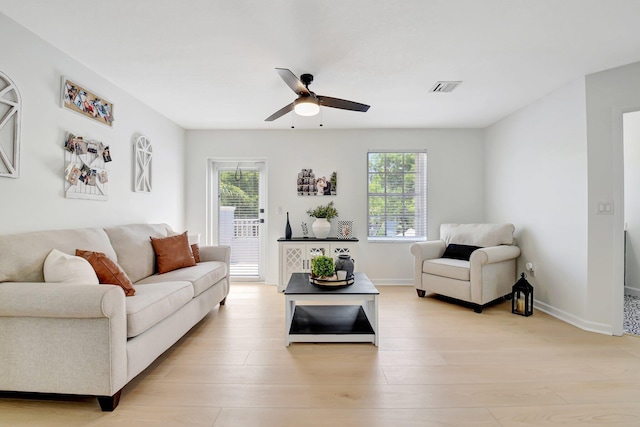 9800 Stover Way, Wellington, FL 33414 - living area with ceiling fan, light wood-type flooring, and baseboards