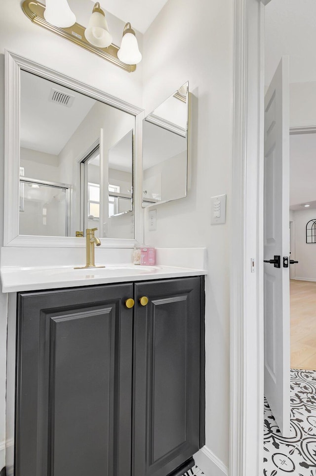 9800 Stover Way, Wellington, FL 33414 - bathroom with vanity, baseboards, and a shower with door