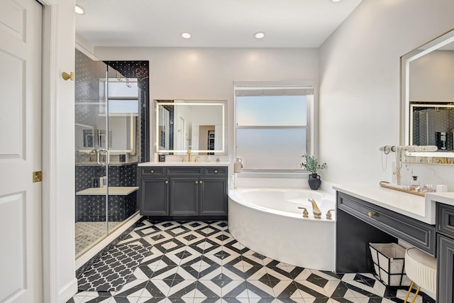 9800 Stover Way, Wellington, FL 33414 - full bath with a shower stall, a bath, and two vanities