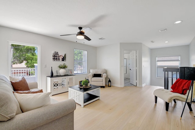 9800 Stover Way, Wellington, FL 33414 - living area featuring light wood-type flooring, plenty of natural light, ceiling fan, recessed lighting, and baseboards