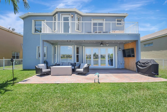 9800 Stover Way, Wellington, FL 33414 - rear view of house with a balcony, an outdoor hangout area, ceiling fan, a patio, and stucco siding