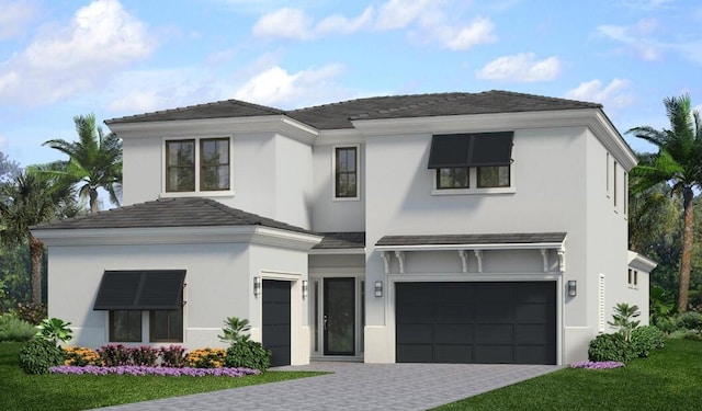 13206 Faberge Pl, Palm Beach Gardens, FL 33418 - view of front of home with a garage and stucco siding
