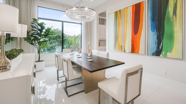 13206 Faberge Pl, Palm Beach Gardens, FL 33418 - dining room with a chandelier and light tile patterned floors